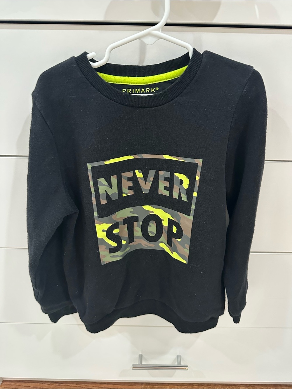 Primark Boys 'Never Stop' Black Sweatshirt with Neon Camouflage Print Size 7